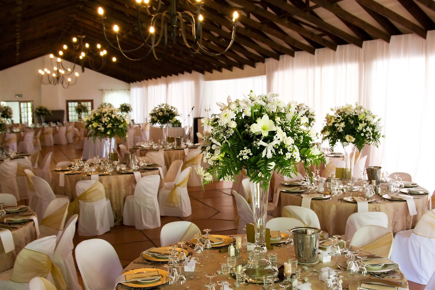 Wedding reception tables arranged for guests